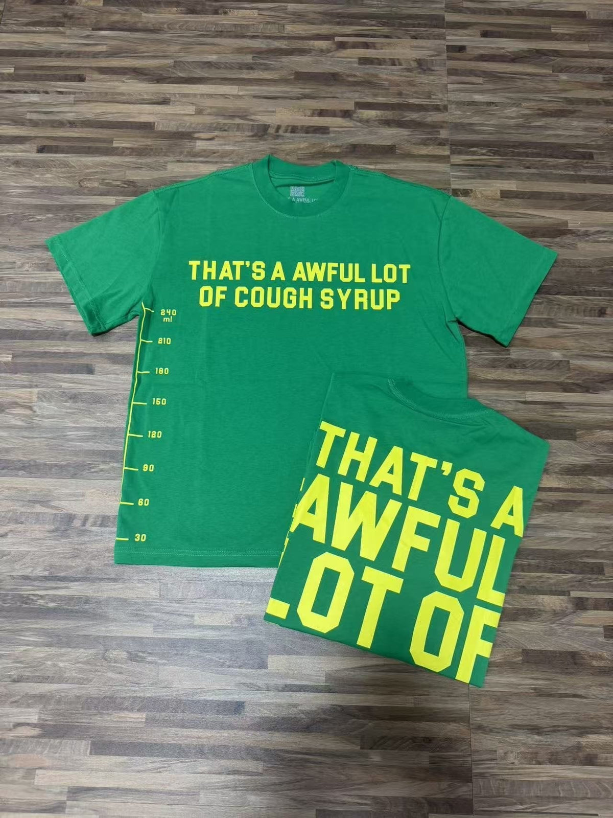 THAT'S A AWFUL LOT OF COUGH SYRUP Yellow Wordmark Short-Sleeve T-Shirt ¡ª context